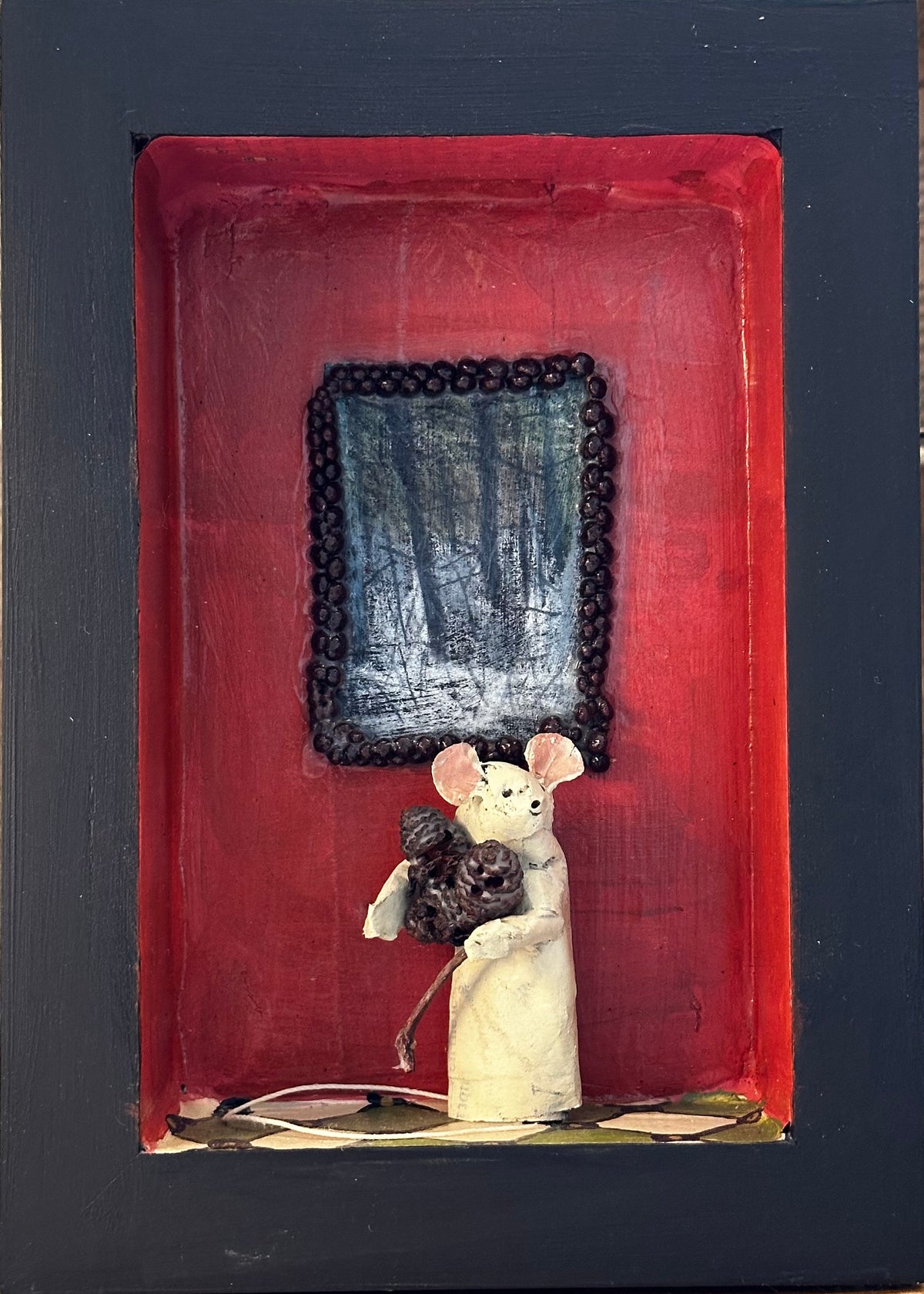 Mouse in red room with painting of winter woods