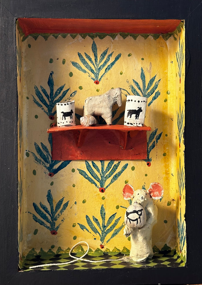 Mouse in stenciled yellow room, red shelf with horse, shell and cups