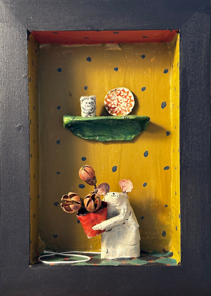 Mouse in ochre room with blue dots