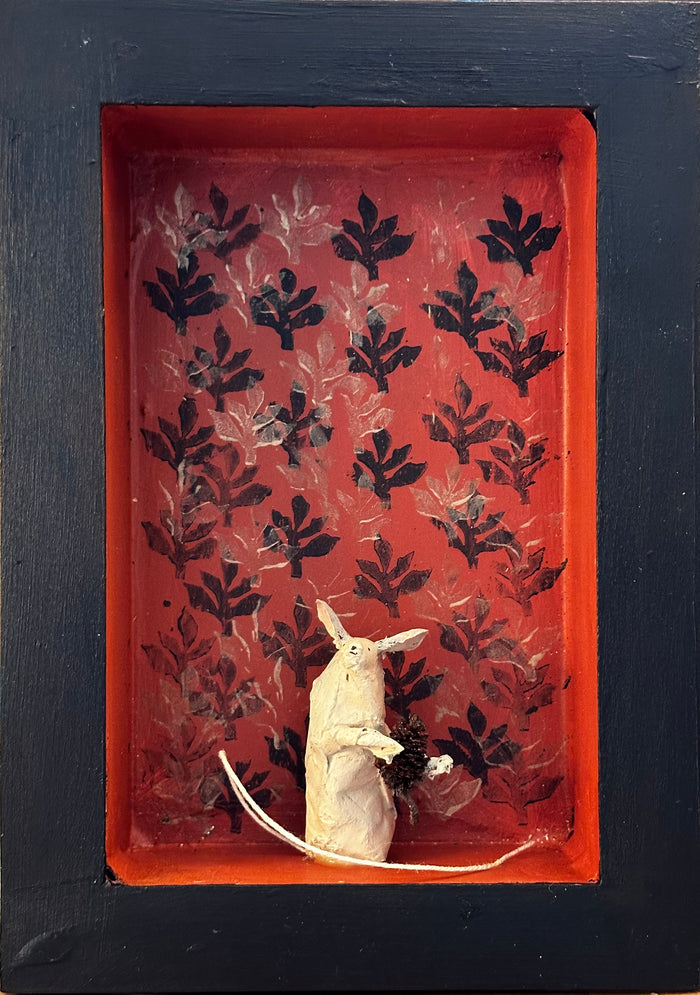 Mouse with alder cone in red room